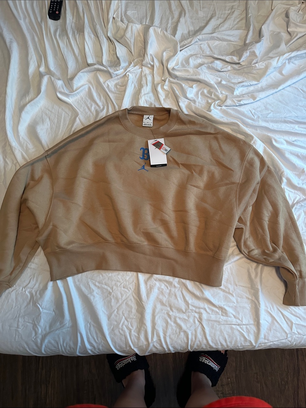Jordan Men’s Tan Crewneck with Blue Jumpman Detail